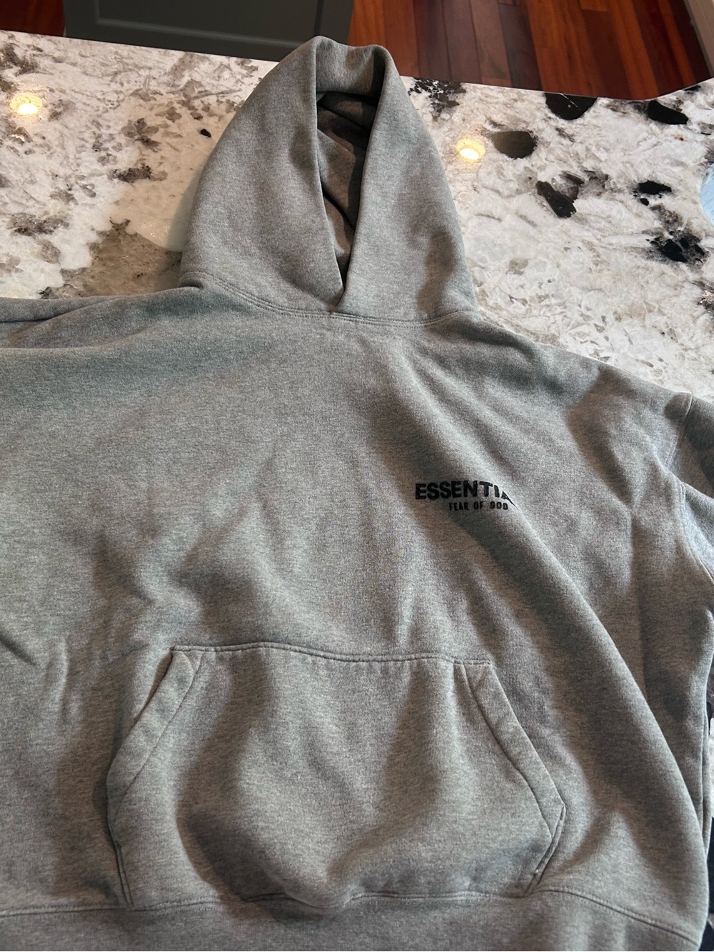 Essentials Grey Pullover Hoodie with Chest Logo